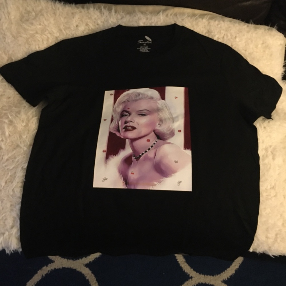 The one and only.. “Marilyn Monroe”… Original never worn made fresh…